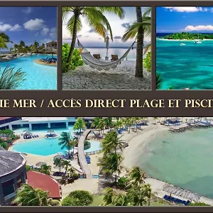 https://vue-mer-acces-direct-a-la-plage-avec-magnifique-piscine.comcaribbean.com